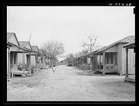 Row of houses. Mexican quarter, San Antonio, Texas by Russell Lee