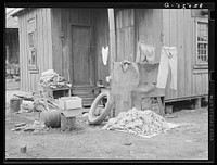 Clothing and personal belongings outside of house in Mexican quarter. San Antonio, Texas by Russell Lee