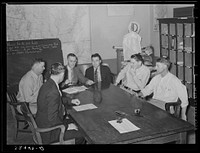Meeting of county judge and commissioners to devise means of raising funds for continuance of county-wide roadwork. San Augustine, Texas by Russell Lee
