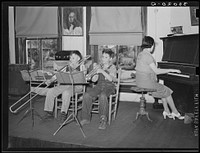 Music lesson. Grade school, San Augustine, Texas by Russell Lee