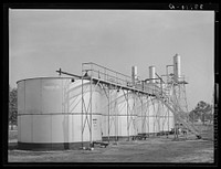 Oil storage tanks out of Kilgore, Texas by Russell Lee