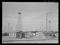 [Untitled photo, possibly related to: Forest of oil derricks. Kigore, Texas] by Russell Lee
