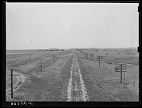 Railroad in the Great Plains near Vernon, Texas by Russell Lee