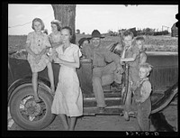 Group of agricultural day laborers in the Arkansas River bottoms near Vian. Oklahoma, Sequoyah County by Russell Lee
