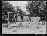 Backyard of home of Indian farmer. McIntosh County, Oklahoma by Russell Lee