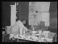 Kitchen table in home of  tenant farmer. Muskogee County, Oklahoma by Russell Lee