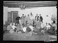 Boys of summer camp with members of the faculty. El Porvenir, New Mexico by Russell Lee