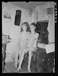 [Untitled photo, possibly related to: Family living in community camp. Oklahoma City, Oklahoma. Father is in hospital with broken back received when he fell from roof on which he was applying shingles. See general caption 21] by Russell Lee