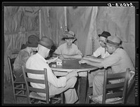 Domino players. Seminole oil field, Oklahoma by Russell Lee