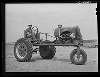 Tractor bought by FSA (Farm Security Administration) loan to German-Russian family in Sheridan County, Kansas. Mr. Schoenfeldt by Russell Lee