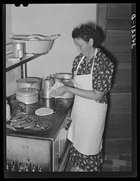 Making tortillas. Spanish-American home near Taos, New Mexico, Taos County by Russell Lee