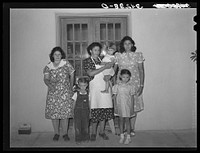 Spanish-American mother with her children near Taos, New Mexico by Russell Lee