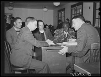 Conference of county FSA (Farm Security Administration) supervisors and officials of local chapter of UCAPAWA (United Cannery, Agricultural, Packing and Allied Workers of America), headed by state representative to national organization. The union is asking for food, loans and work for local sharecroppers and tenant farmers. Creek County, Oklahoma by Russell Lee