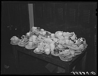 Dirty dishes after Jaycees' supper at high school. Eufaula, Oklahoma. See general caption number 25 by Russell Lee