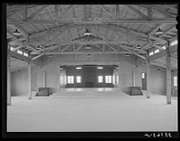[Untitled photo, possibly related to: Interior of community building at the migratory labor camp. Sinton, Texas] by Russell Lee