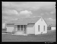 Type of house built for permanent agricultural workers at migratory labor camp. Robstown, Texas by Russell Lee