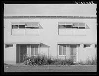 [Untitled photo, possibly related to: Apartment house at the Arizona part-time farms. Chandler Unit, Maricopa County, Arizona] by Russell Lee