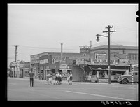 High school students crossing the street. Phoenix, Arizona by Russell Lee