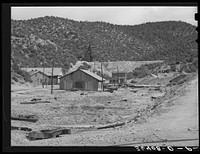 Old buildings and working of Burro Mountain. Copper County, Tyrone, New Mexico by Russell Lee