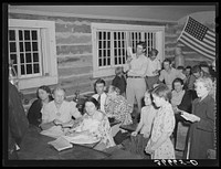 [Untitled photo, possibly related to: Farmers and their families enjoying the literary society meeting. Pie Town, New Mexico] by Russell Lee