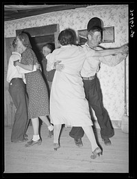Round dance. Pie Town, New Mexico. Among people where square dancing is the usual form of dancing, regular ball room dancing is called "round dancing" by Russell Lee