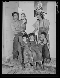 Spanish-American family. Chamisal, New Mexico by Russell Lee
