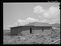 Home of Spanish-American farmer. Amalia, New Mexico by Russell Lee