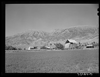 [Untitled photo, possibly related to: Hay barn on farm at foot of Wasatch Mountains. Box Elder County, Utah] by Russell Lee