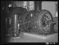 Water turbine and electric generator at municipal power plant. Logan, Utah by Russell Lee