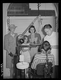 [Untitled photo, possibly related to: Mormon farm family, members of FSA (Farm Security Administration) dental cooperative, in dentist's office. Tremonton, Box Elder County, Utah] by Russell Lee