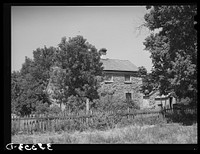 One of the older rock houses in the village of Mendon, Utah, second oldest Mormon settlement north of Salt Lake City by Russell Lee