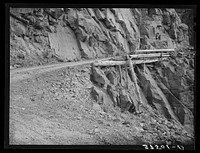 [Untitled photo, possibly related to: Detail of mountain road leading to Smugglers Mine. Telluride, Colorado] by Russell Lee
