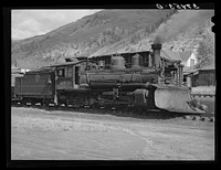 Locomotive of the D. and R.G.W. railroad with snowplow attached. Telluride, Colorado by Russell Lee