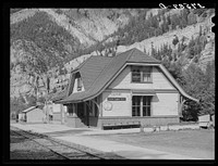 Railroad station of the D.& R.G.W. Railroad at Ouray, Colorado. This narrow gauge line formerly had passenger service but now is confined to freight service by Russell Lee