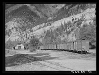 Railroad station of the D.& R.G.W. Railroad at Ouray, Colorado. This narrow gauge line formerly had passenger service but now is confined to freight service by Russell Lee