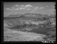 Irrigation water reservoir of FSA (Farm Security Administration) clients. Washington County, Utah by Russell Lee