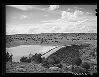[Untitled photo, possibly related to: Main dam at Concho, Arizona. This is about twenty five years old and impounds the water which comes from a series of springs and which is used for irrigation] by Russell Lee