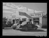 Business enterprises in Central City, boom town near Shasta Dam. Shasta County, California by Russell Lee