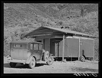 Home of construction worker at Shasta Dam. Summit City, California. Notice that the trailer has been incorporated into the house by Russell Lee
