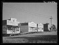 [Untitled photo, possibly related to: Some of the business enterprises at Central Valley, California. This section of the town has lost business because the main highway was enrouted and left it stranded. Central Valley is one of the boom towns near Shasta Dam] by Russell Lee