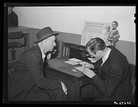 Applicant for employment being interviewed at the Texas State Employment Service office. Corpus Christi, Texas by Russell Lee