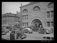 [Untitled photo, possibly related to: Crowd coming out of Pilgrim Baptist Church. Southside of Chicago, Illinois] by Russell Lee
