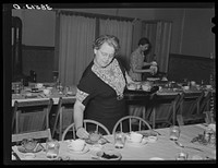 Serving dinner for members of the Loomis Fruit Association after their fortieth annual meeting. Loomis, Placer County, California by Russell Lee