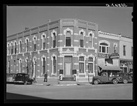 First National Bank corner. Norton, Kansas by Russell Lee