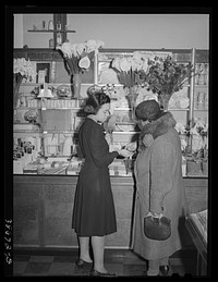 Ten-cent store on 47th Street. Customers are mostly es. Chicago, Illinois by Russell Lee