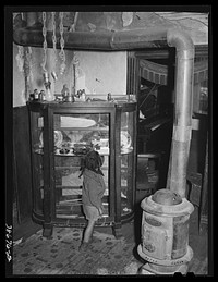 [Untitled photo, possibly related to: Dining room of  family which is on relief. Chicago, Illinios] by Russell Lee