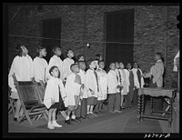 The children's choir at a Pentecostal church. Chicago, Illinois by Russell Lee