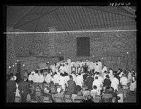 Opening of services at the Pentecostal church. Chicago, Illinois by Russell Lee