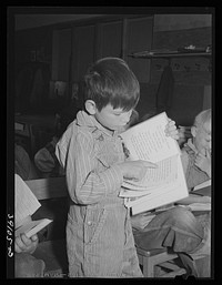 [Untitled photo, possibly related to:Children in school at the FSA (Farm Security Administration) farm workers' camp. Caldwell, Idaho. Caldwell did not have room in its schools for the children from the camp and Caldwell furnishes teachers and FSA furnishes schoolrooms at the camp] by Russell Lee