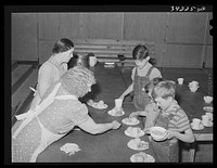 Lunch for schoolchildren at the FSA (Farm Security Administration) farm workers' camp. Caldwell, Idaho by Russell Lee